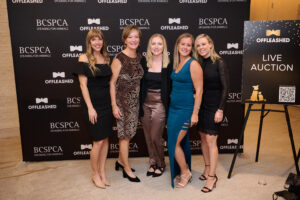 Five women in front of the step and repeat at BC SPCA's Offleashed Vancouver Gala 2023
