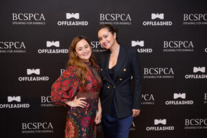 Two woman in front of the step and repeat at BC SPCA's Offleashed Vancouver Gala 2023