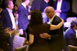 Guests about to hug at BC SPCA's Offleashed Vancouver Gala 2023